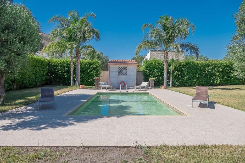 Villa IslaMaris con Piscina nel Boomerang Village a Torre Colimena