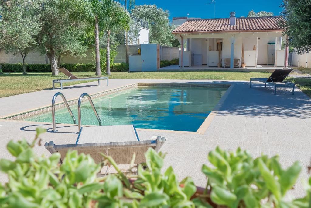 Villa IslaMaris con Piscina nel Boomerang Village a Torre Colimena