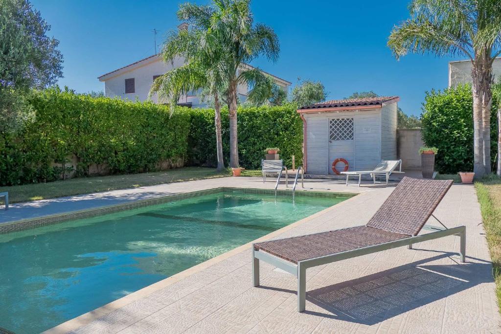 Villa IslaMaris con Piscina nel Boomerang Village a Torre Colimena