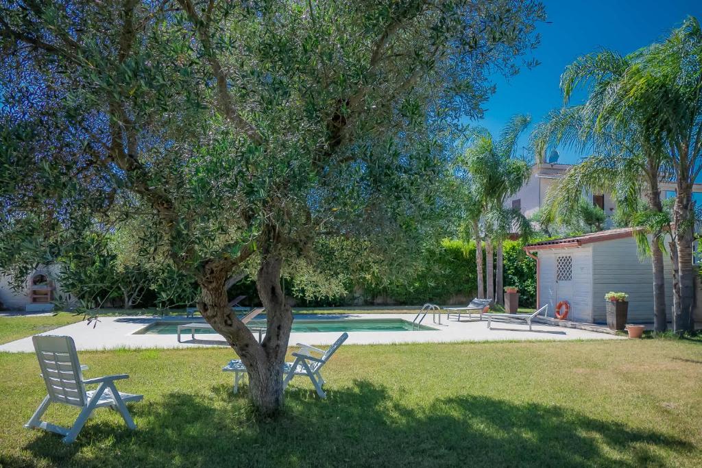 Villa IslaMaris con Piscina nel Boomerang Village a Torre Colimena
