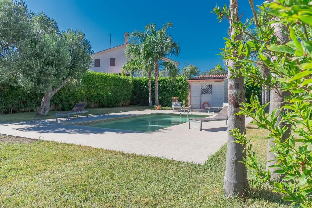 Villa IslaMaris con Piscina nel Boomerang Village a Torre Colimena