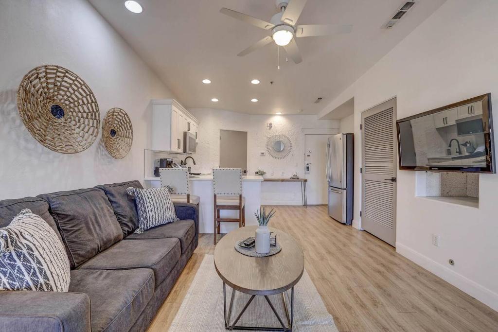 a living room with a couch and a table at Relaxing Quiet Resort - Dog Friendly in St. George