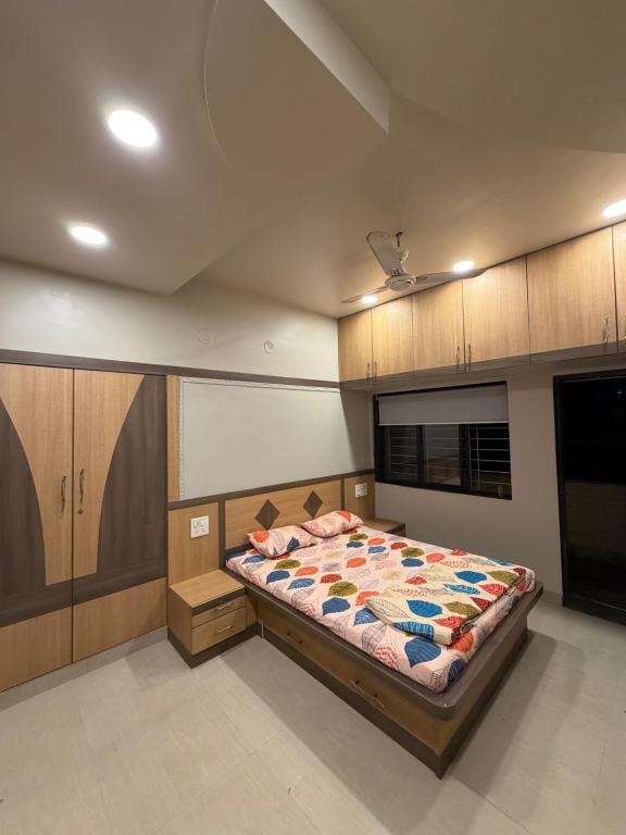 a bedroom with a bed in a room at The Highstreet Stay in Pune