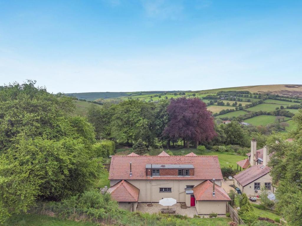 an aerial view of a house in a field at 2 Bed in Minehead oc-77362 in Withypool