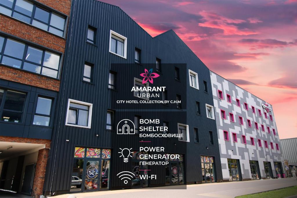 a building with a mural on the side of it at Amarant Urban Hotel by CHM in Kyiv