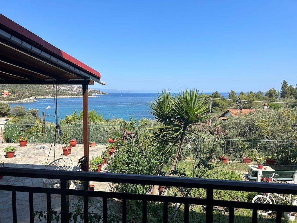 a view of the ocean from a balcony at Grandpa BILL's house 6 in Pyrgadikia