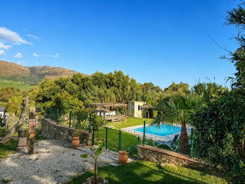 an external view of a villa with a swimming pool at La casa de Rodrigo y Manuela in Tarifa