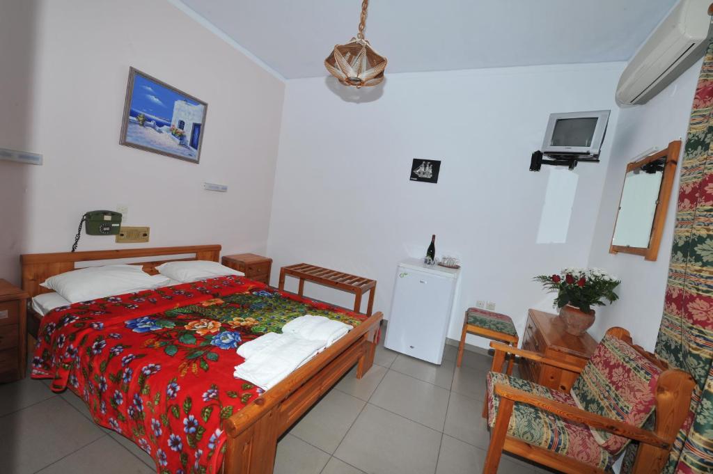Postel nebo postele na pokoji v ubytování Babis Hotel