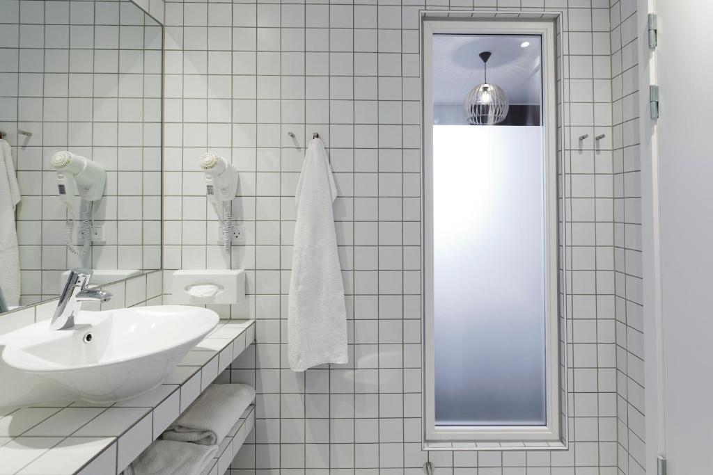 Koupelna v ubytování Hotel Strandparken