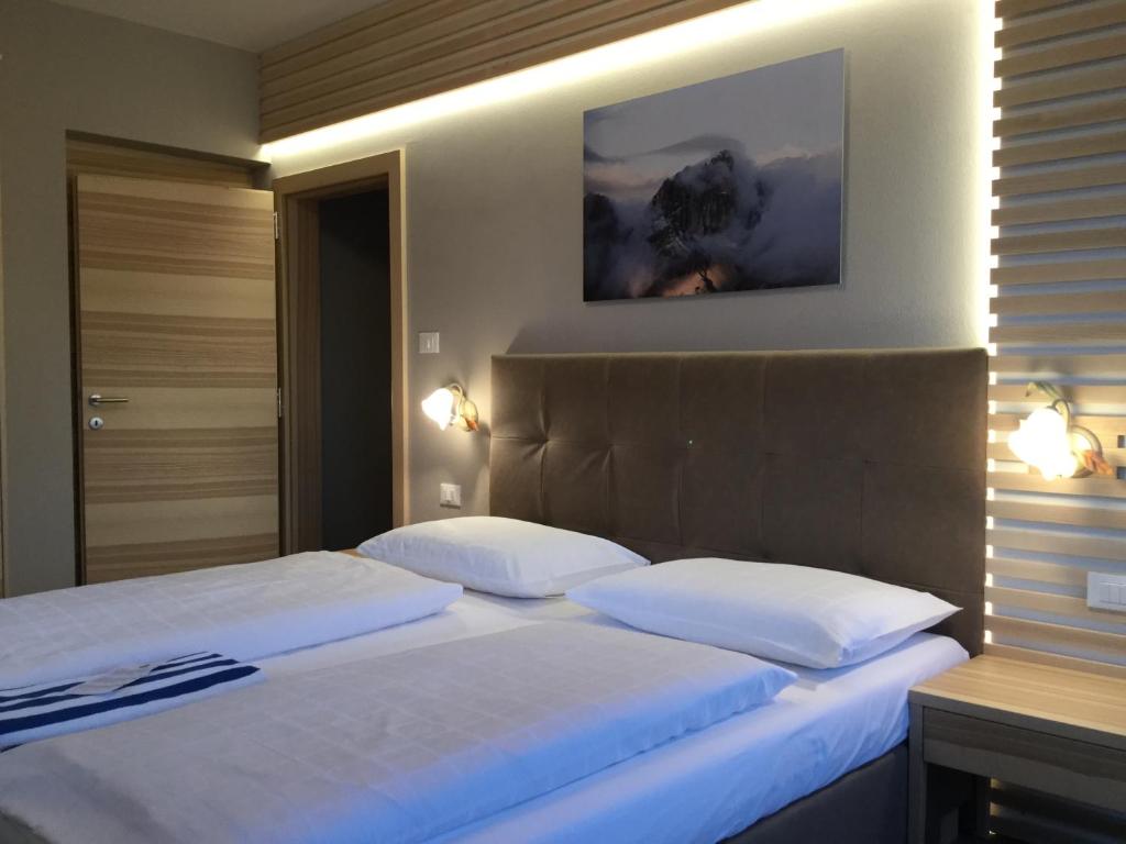 Postel nebo postele na pokoji v ubytování Ruster Resort