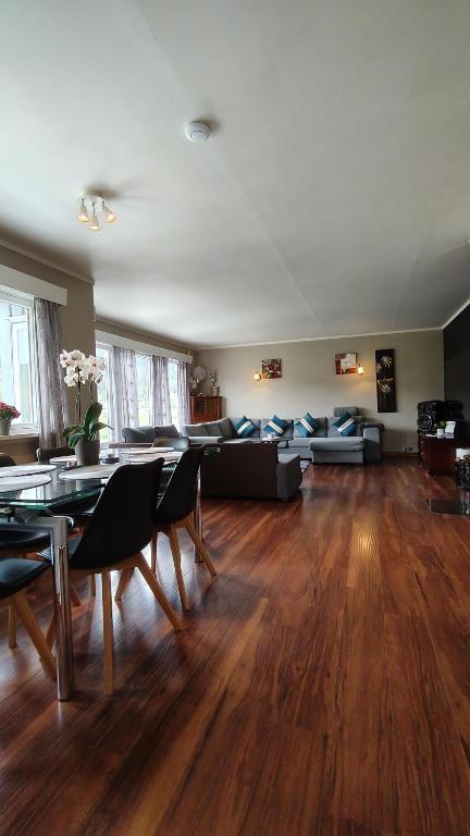 a living room with a couch and a table at Stryn Norway in Stryn