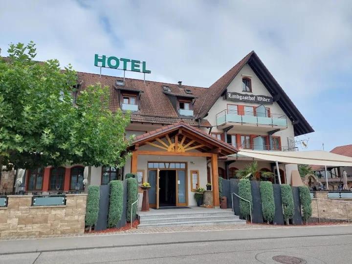 a hotel sitting on the side of a street at Wider Apartment UG mit Tageslicht in Gottmadingen