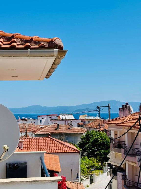 a view of a city from a building at MG Sea View Apartments & Private Parking in Pefkochori