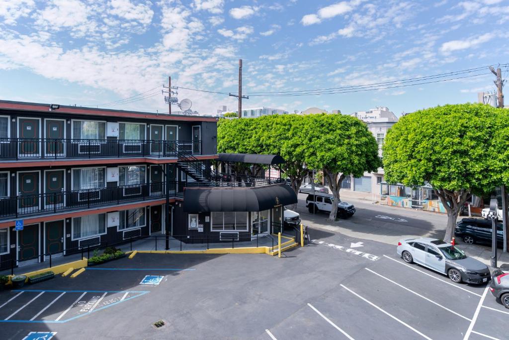 an aerial view of a building with a parking lot at Symphony Inn in San Francisco