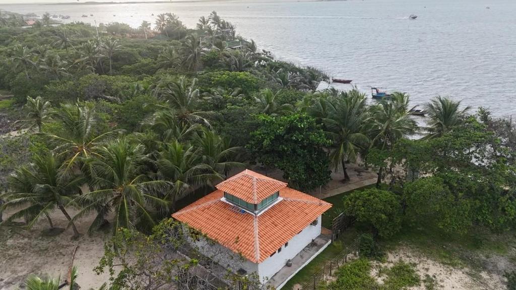 an aerial view of a house with an orange roof at Casa Monan Atins Beach in Barreirinhas