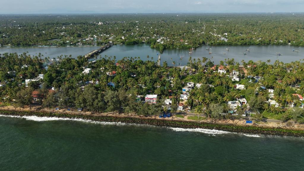 an aerial view of an island in the water at Palm Beach View Resort Cherai in Cherai Beach