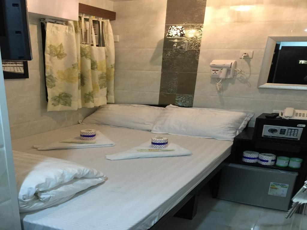 Postel nebo postele na pokoji v ubytování Skyview Hostel