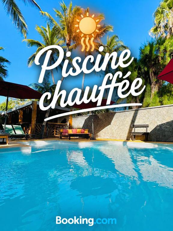 a picture of a swimming pool at a resort with the text pressure challenge critique at Hôtel Coco Island in Saint-Gilles-les-Bains