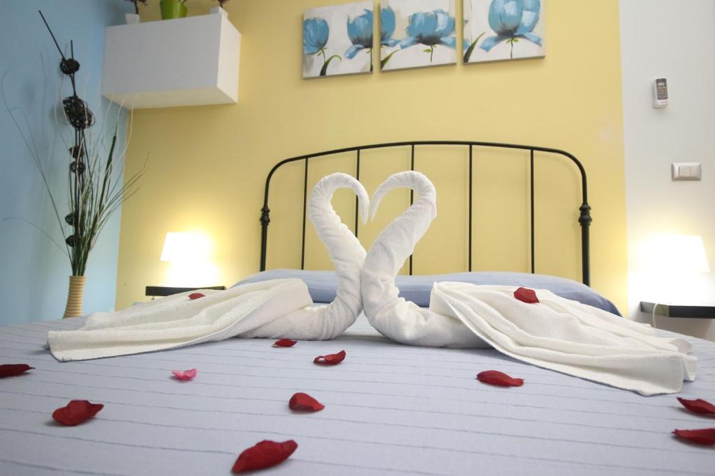 Postel nebo postele na pokoji v ubytování Nemi rooms