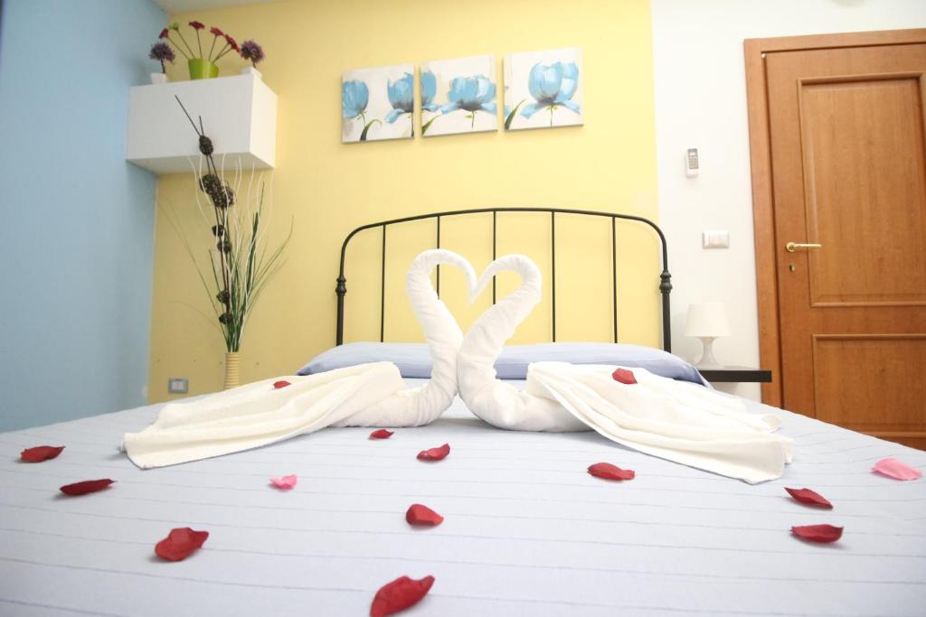 Postel nebo postele na pokoji v ubytování Nemi rooms
