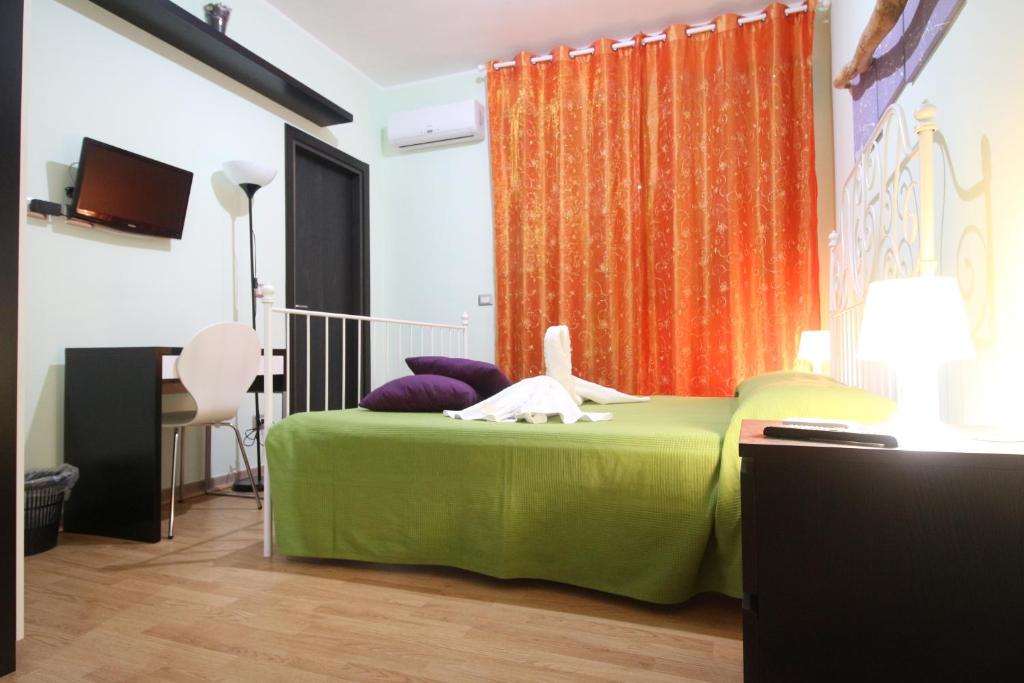 Postel nebo postele na pokoji v ubytování Nemi rooms