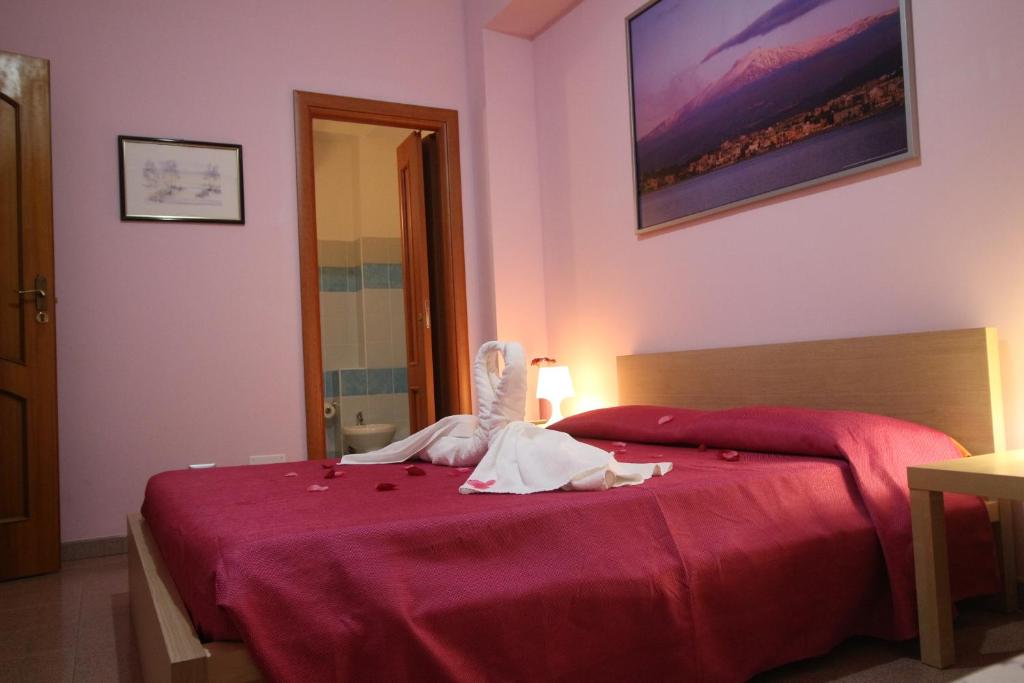 Postel nebo postele na pokoji v ubytování Nemi rooms