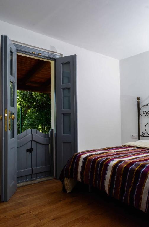 Postel nebo postele na pokoji v ubytování Casa Candelas