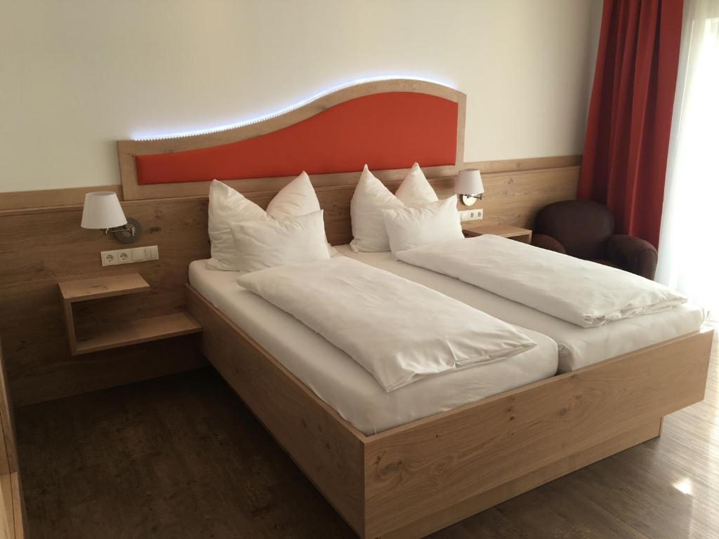 Postel nebo postele na pokoji v ubytování Seminarhotel Daniels