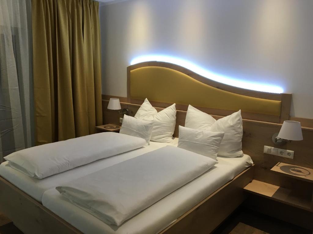 Postel nebo postele na pokoji v ubytování Seminarhotel Daniels