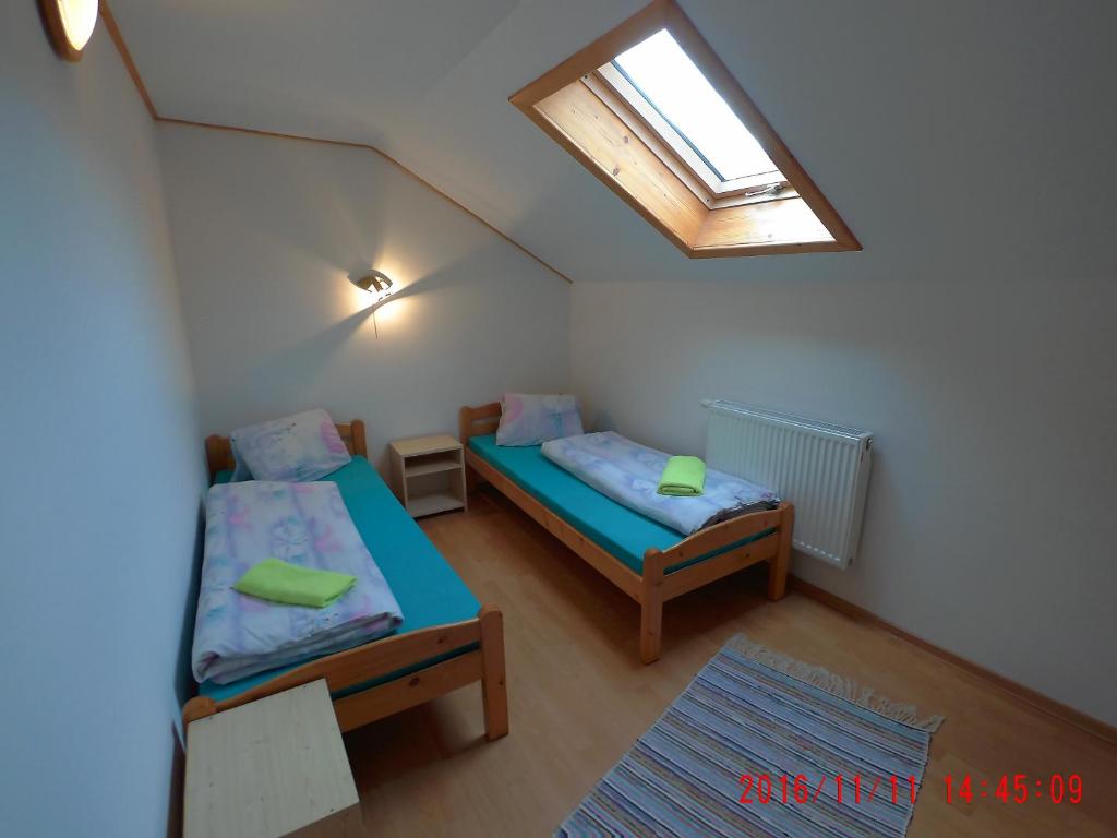 Postel nebo postele na pokoji v ubytování Apartment Majerčák