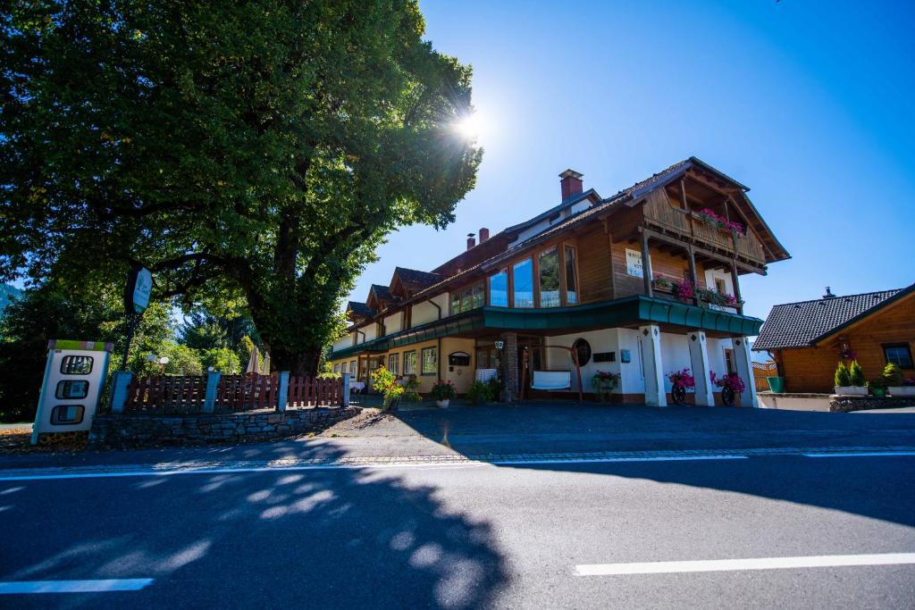 a house on the side of a street at Naturgut Gailtal in Sankt Stefan an der Gail