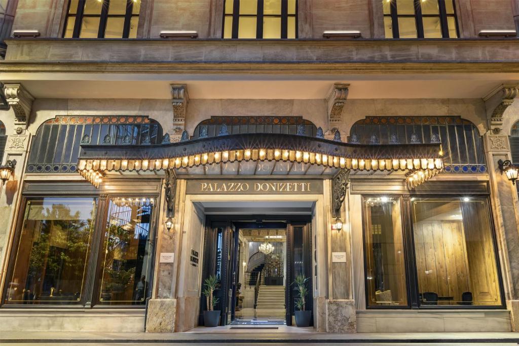 a store front of a building with a doorway at Palazzo Donizetti Istanbul, Tapestry Collection by Hilton in Istanbul