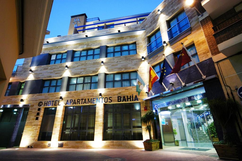 a building with a sign on the front of it at Aparthotel Bahía in San Pedro del Pinatar