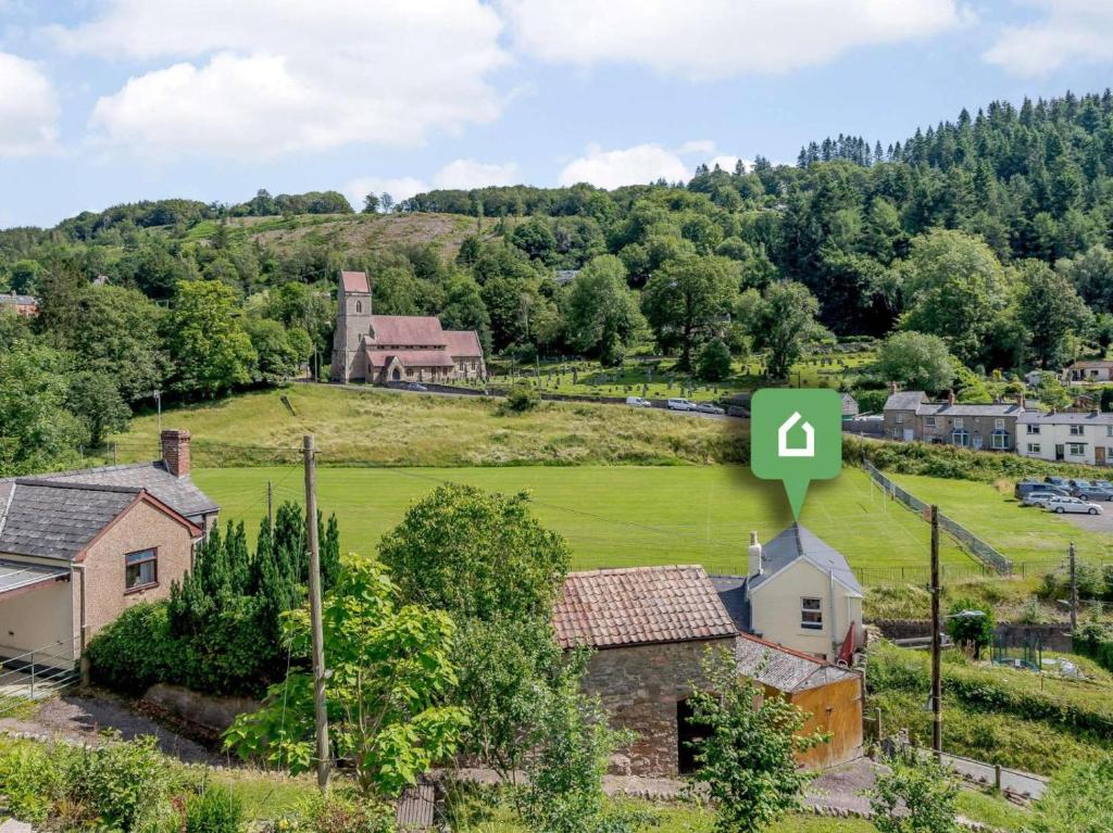 an aerial view of a village with a green number four sign at 2 Bed in Lydbrook oc-83665 in Lydbrook