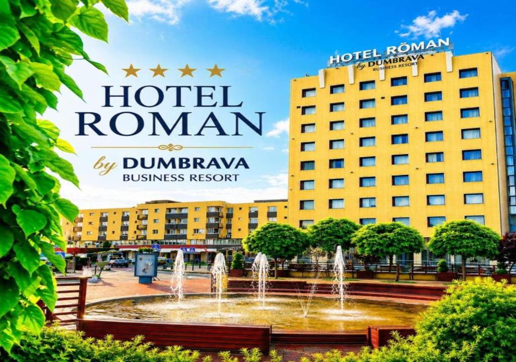 a hotel room with a fountain and two buildings at Hotel Roman by Dumbrava Business Resort in Roman
