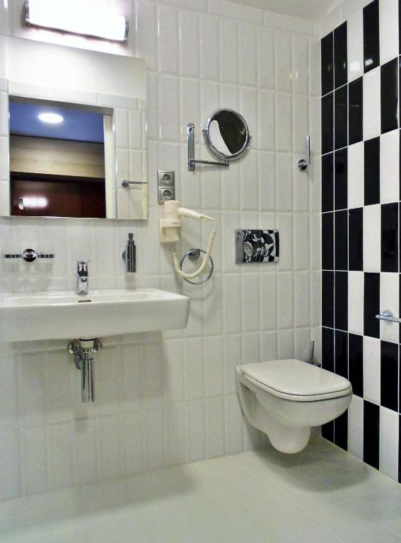 Kúpeľňa v ubytovaní Gokart Hotel