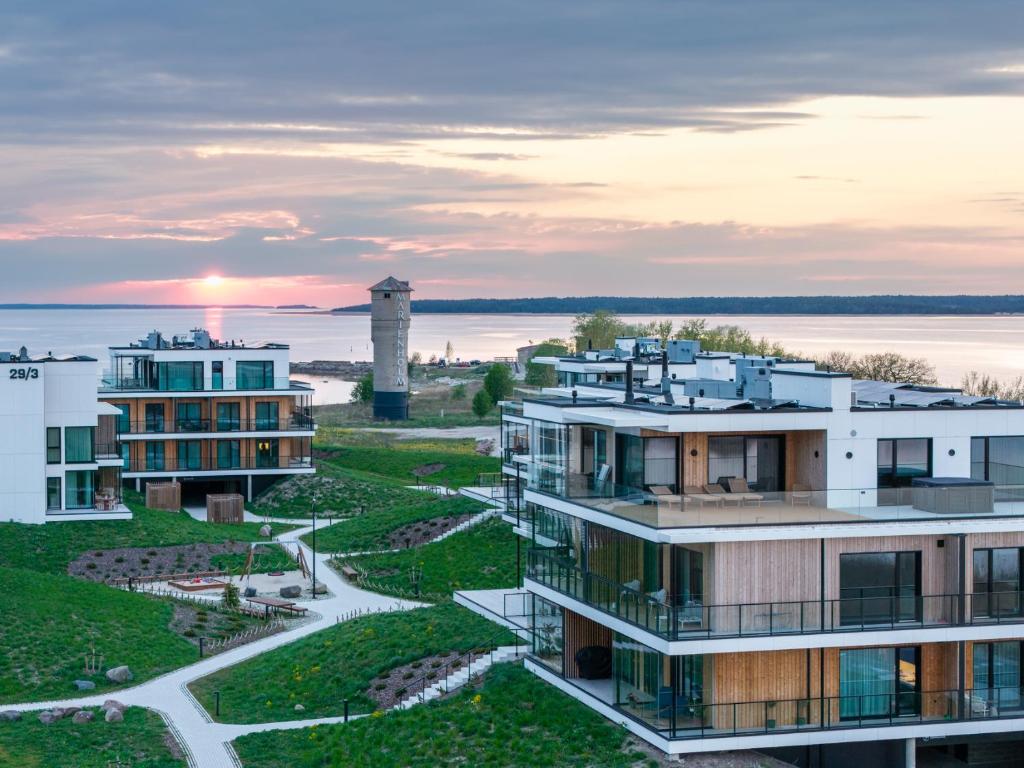 an aerial view of a building and the water at Marienholm Seaview Apartment in Haapsalu