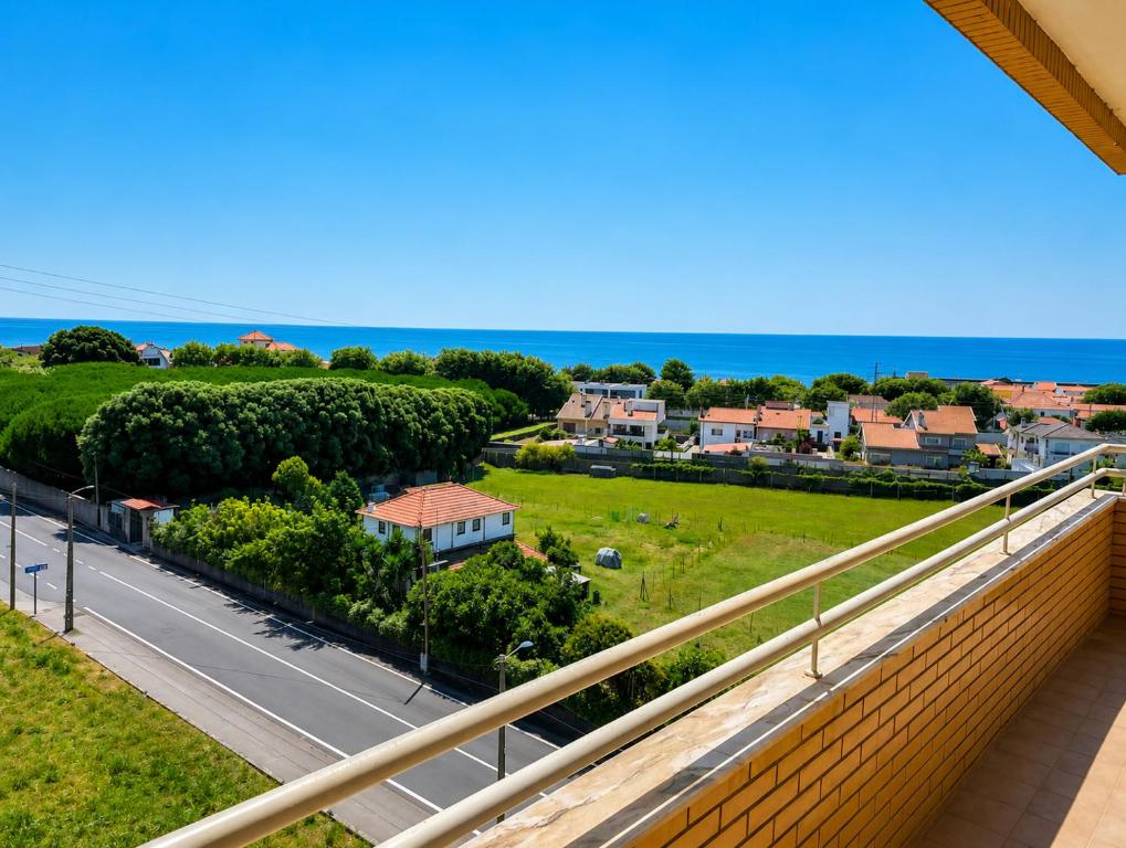 a balcony with a view of a road and houses at PORTO AGUDA BEACH ***** in Arcozelo