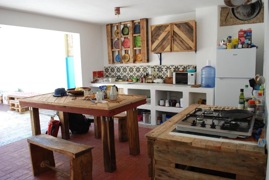 Kuchyň nebo kuchyňský kout v ubytování La Choza Guesthouse