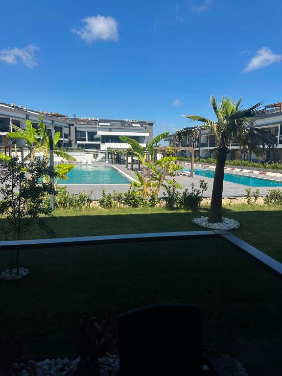 a view of a resort with a swimming pool at Mertcan Doruk in Side