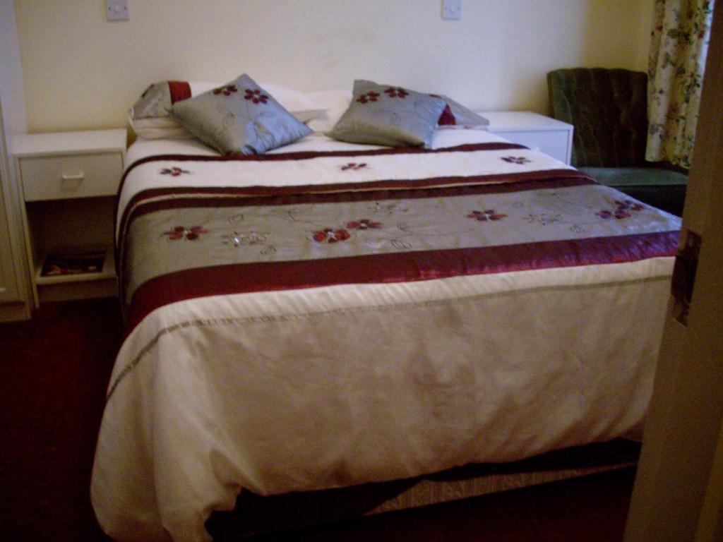 Postel nebo postele na pokoji v ubytování Viking Hotel