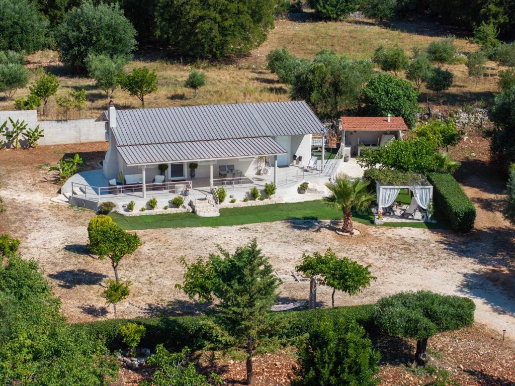 an aerial view of a house with a garden at Julia's Home in Karavomylos