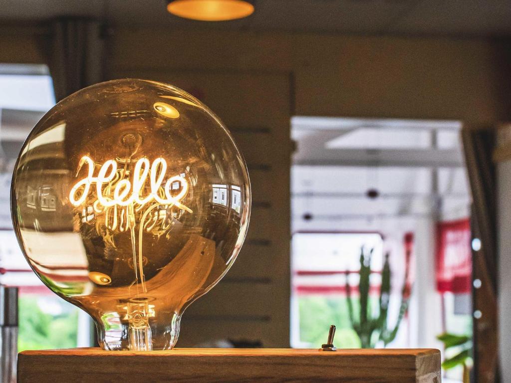 a glass ball with the word radio written on it at ibis Saint Brieuc Yffiniac in Yffiniac