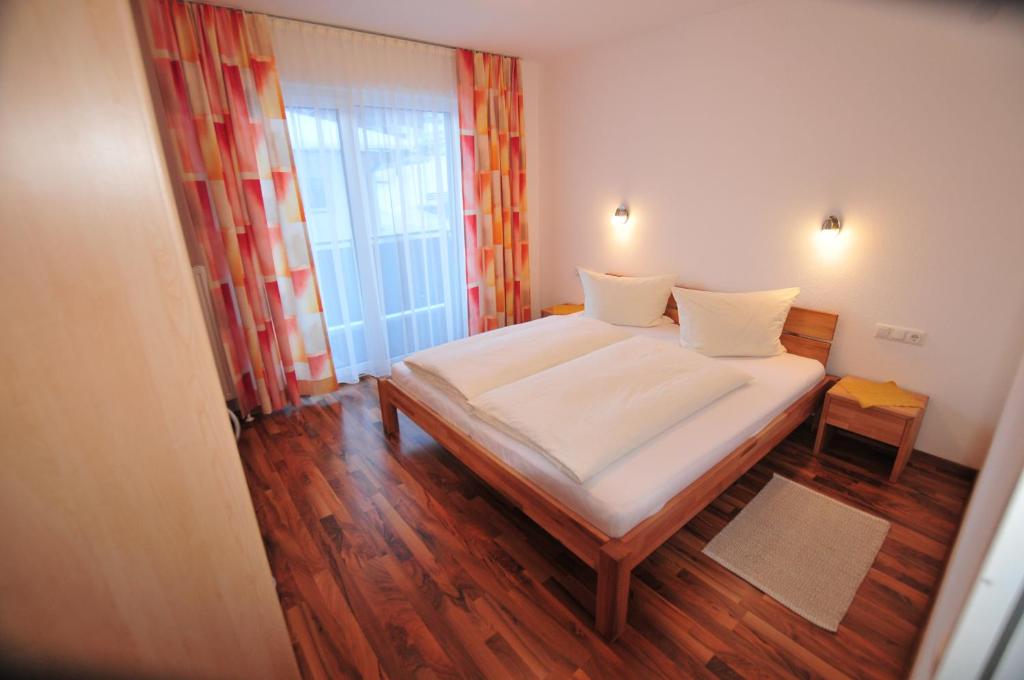 Postel nebo postele na pokoji v ubytování Haus Scheiber