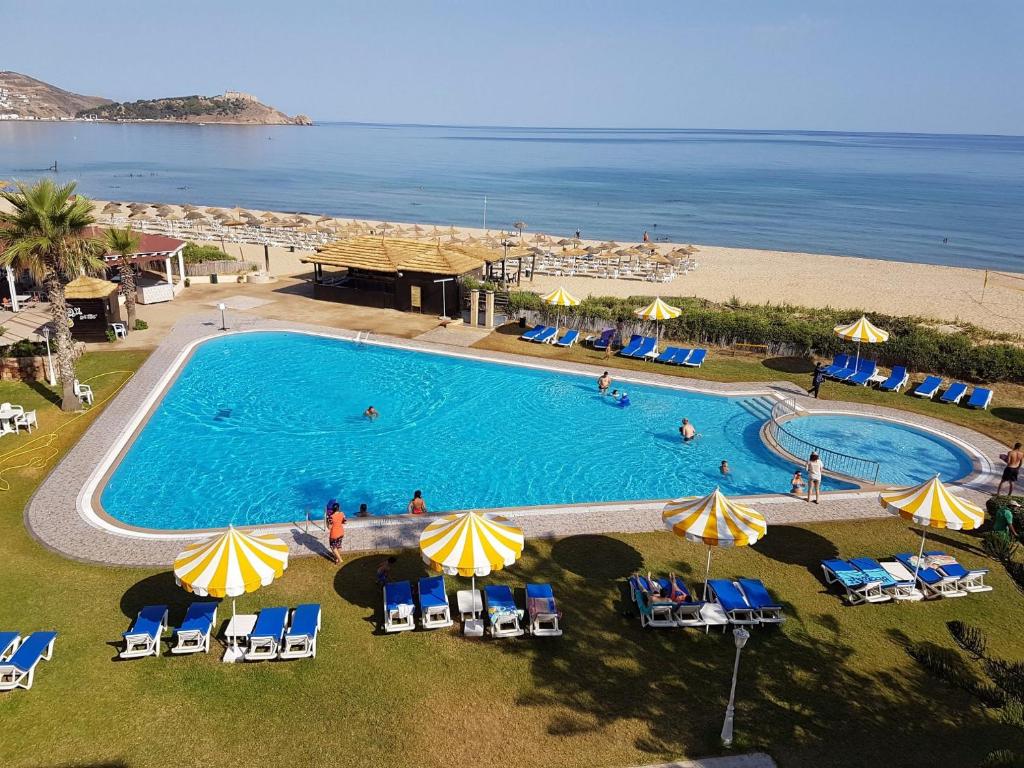 an overhead view of a swimming pool next to a beach at Mehari Tabarka in Tabarka