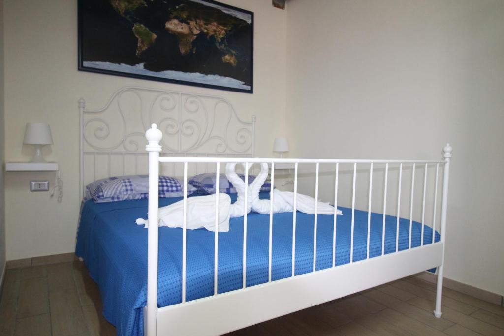 Postel nebo postele na pokoji v ubytování Nemi rooms