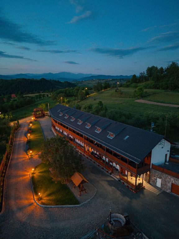 an overhead view of a train station with lights at Pensiunea la Tăuț in Călineşti