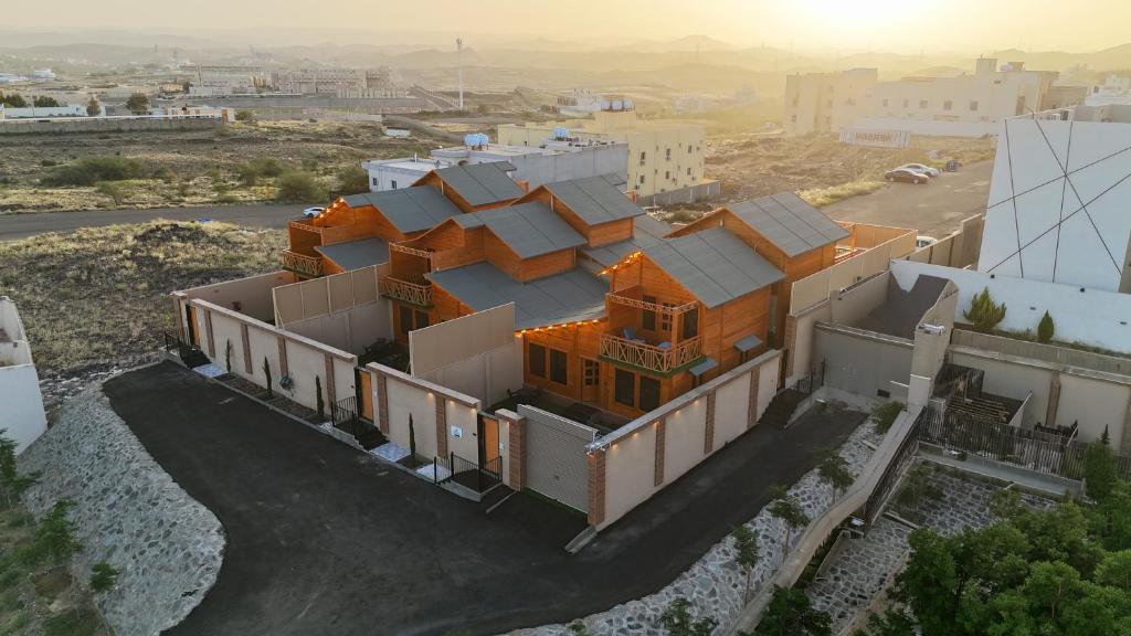 an aerial view of a building in a city at اكواخ مشارف ابها in Mahlal