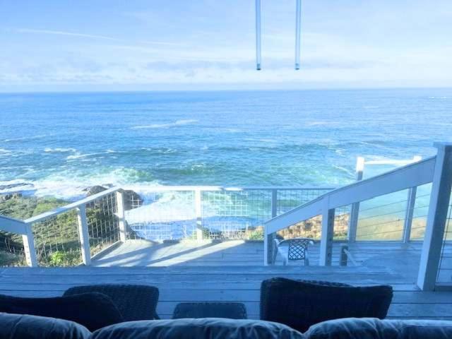 a view of the ocean from a balcony of a house at The Lookout Point in Gualala