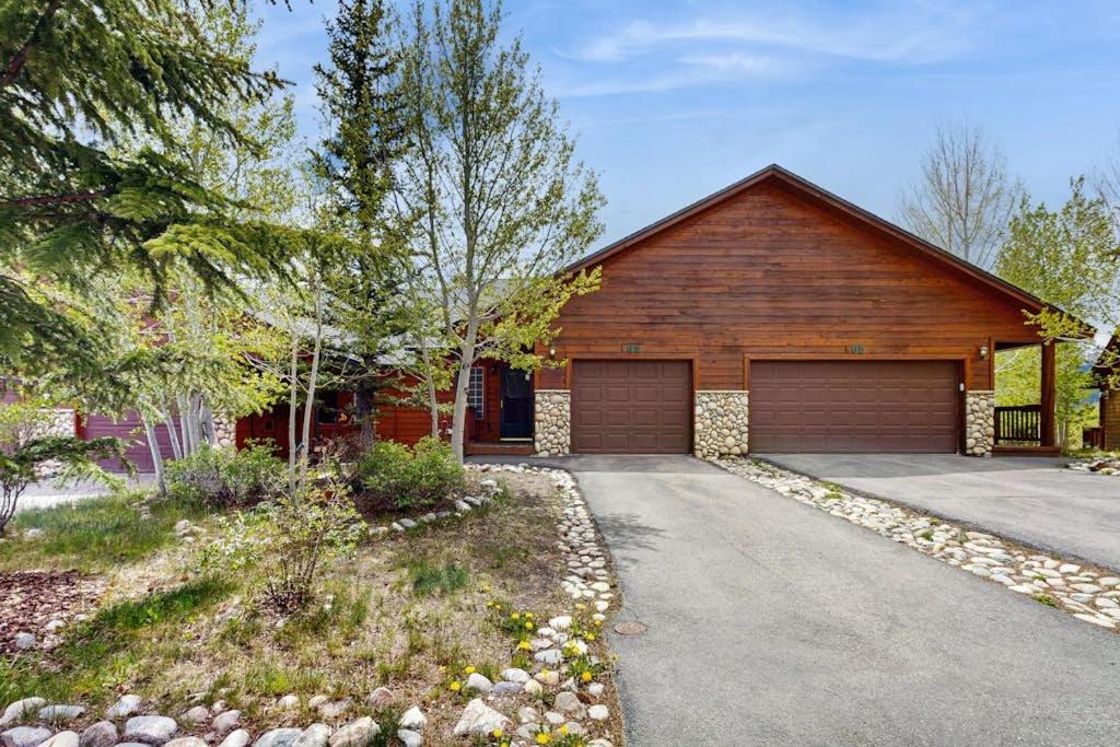 a house with a garage and a driveway at Lookout Ridge 63 in Dillon